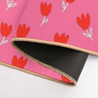Red Tulips with White Leaves And Stems Drawn on A Pink Background.  Repositionable Bath Mat