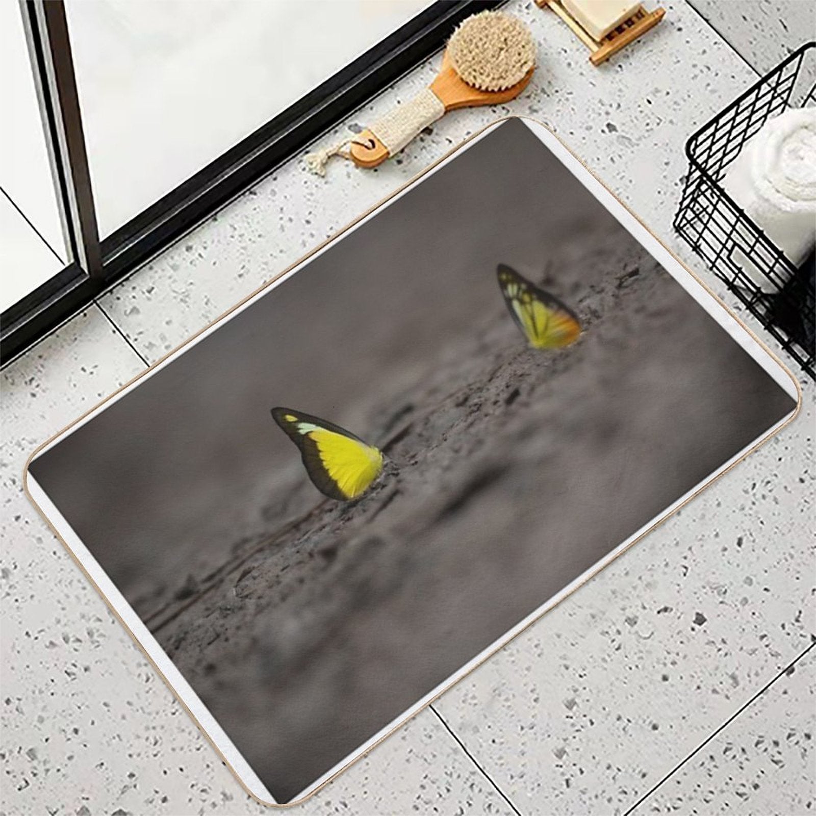This Image Captures A Brightly Colored Butterfly Settled on Rugged Terrain, Offering A Striking Contrast Between Fragility And R  Versatile Bath Mat