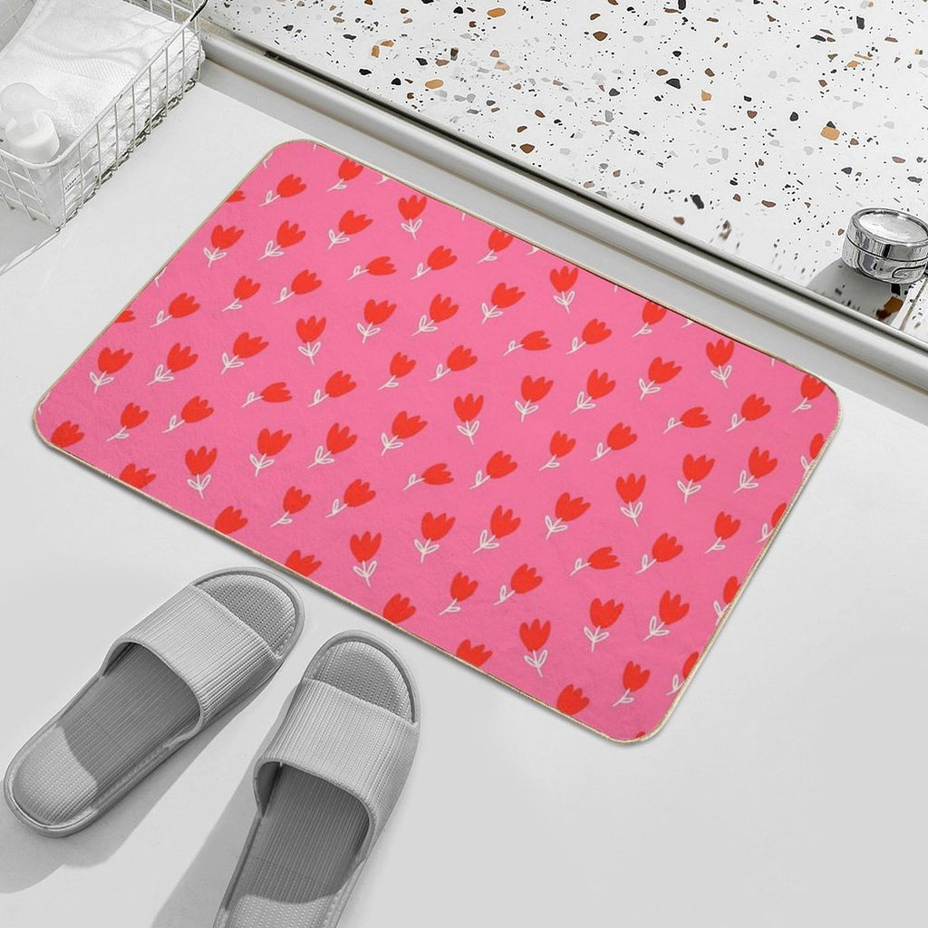 Red Tulips with White Leaves And Stems Drawn on A Pink Background.  Repositionable Bath Mat