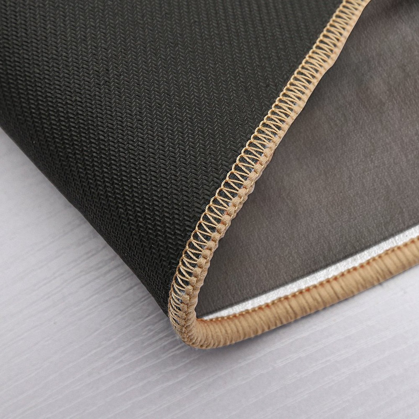 This Image Captures A Brightly Colored Butterfly Settled on Rugged Terrain, Offering A Striking Contrast Between Fragility And R  Versatile Bath Mat