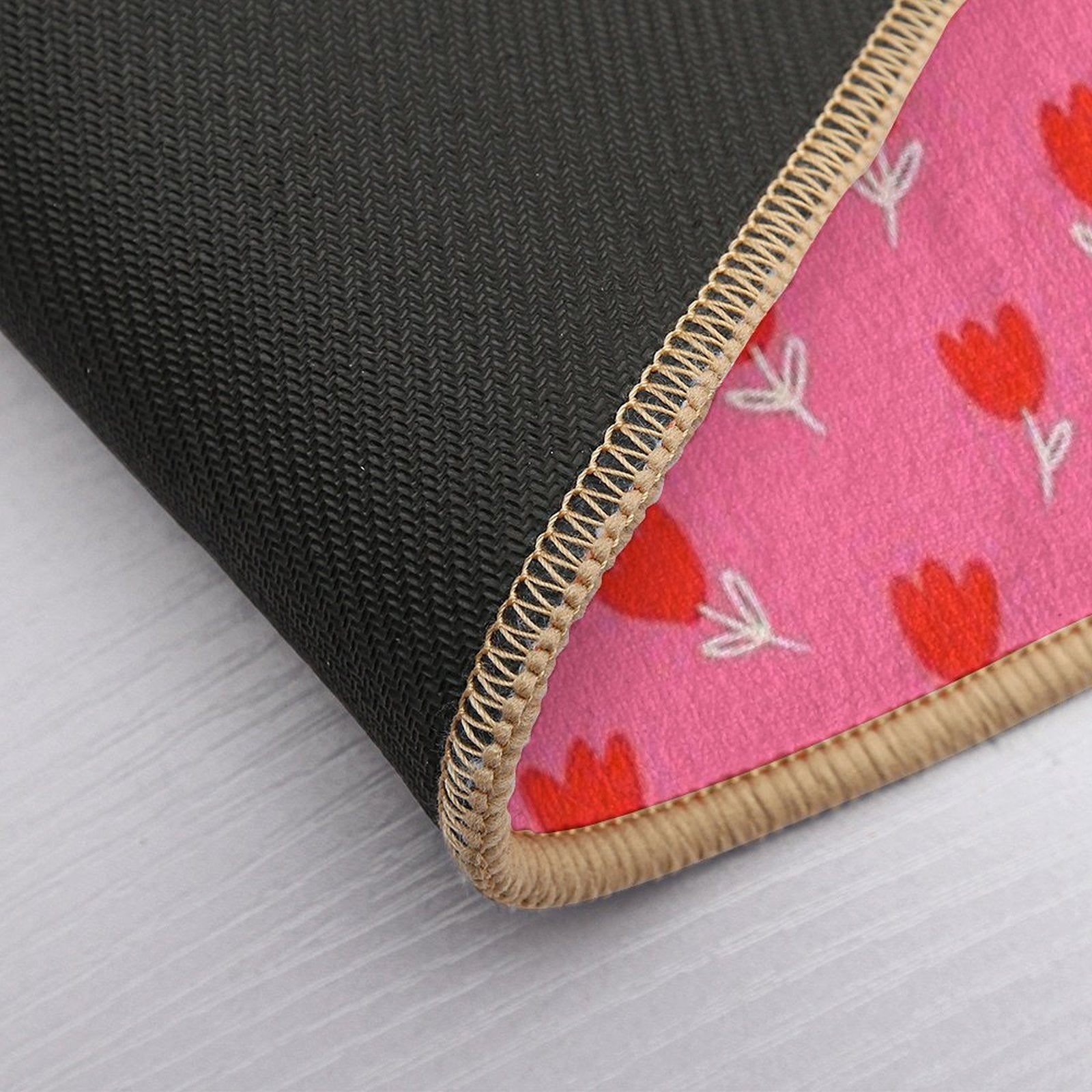 Red Tulips with White Leaves And Stems Drawn on A Pink Background.  Repositionable Bath Mat