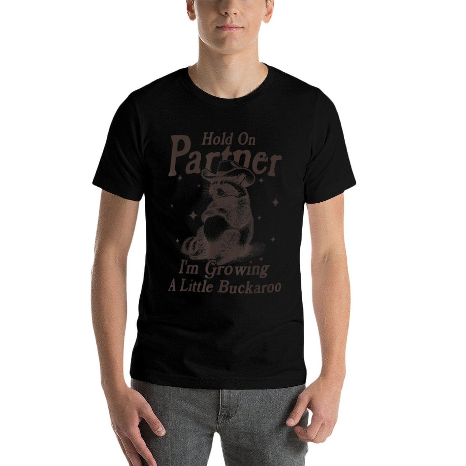 Hold On Partner Im Growing A Little Buckaroo Funny Raccoon  Affordable Price T-Shirt