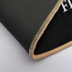 A Tim Burton Film  White on Black  Non-Slip Bath Mat