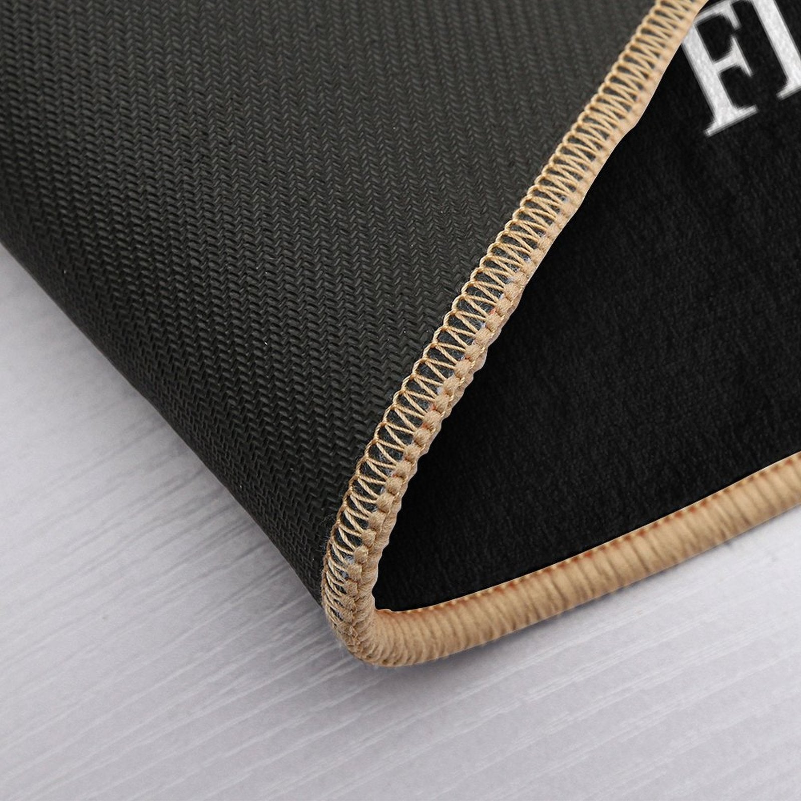 A Tim Burton Film  White on Black  Non-Slip Bath Mat