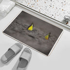 This Image Captures A Brightly Colored Butterfly Settled on Rugged Terrain, Offering A Striking Contrast Between Fragility And R  Versatile Bath Mat